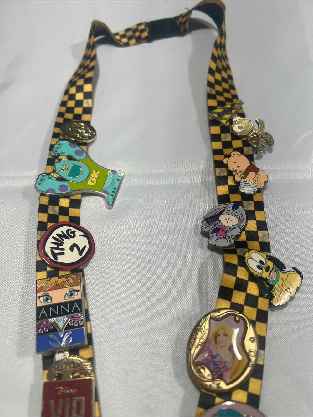 Checkered Universal Studios Harry Potter Lanyard with 16 Character Pins.